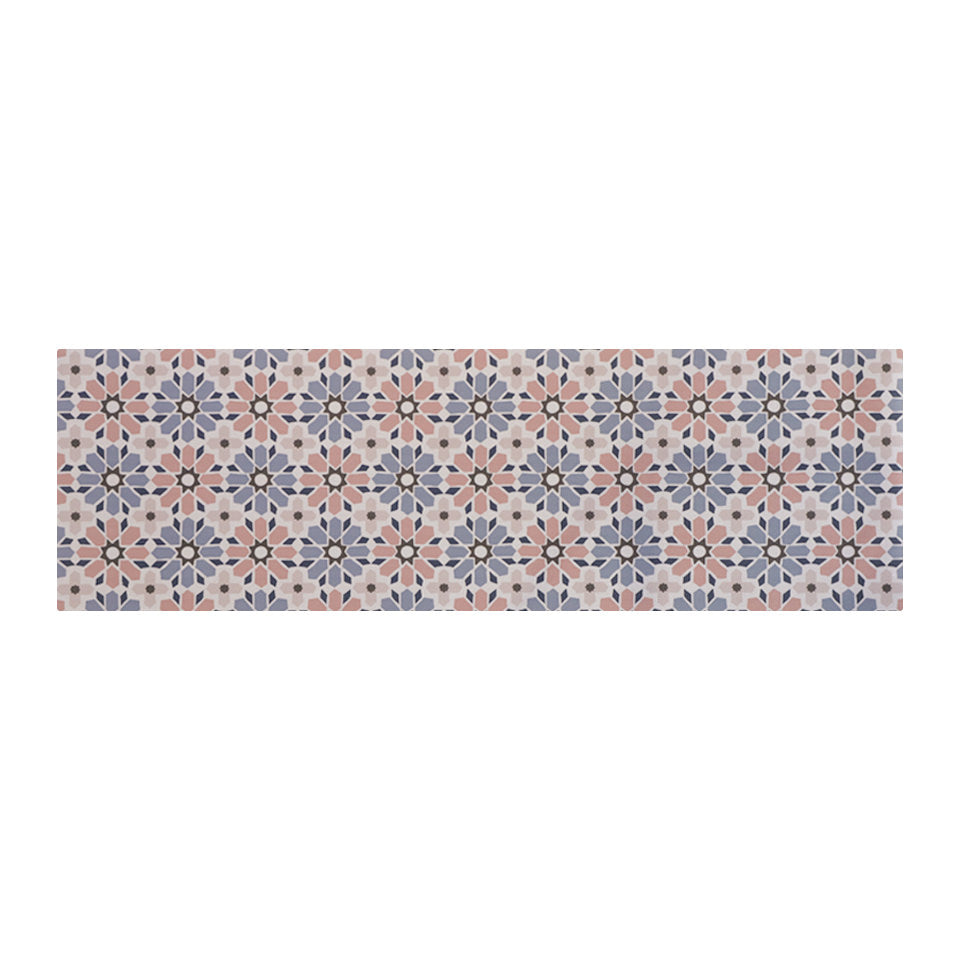 Indoor runner sized floor mat shown in Moroccan tiled printed pattern with pinks, blues, and beige