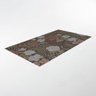 Overhead angled view of Dark floral with linen texture on low profile washable floor mat