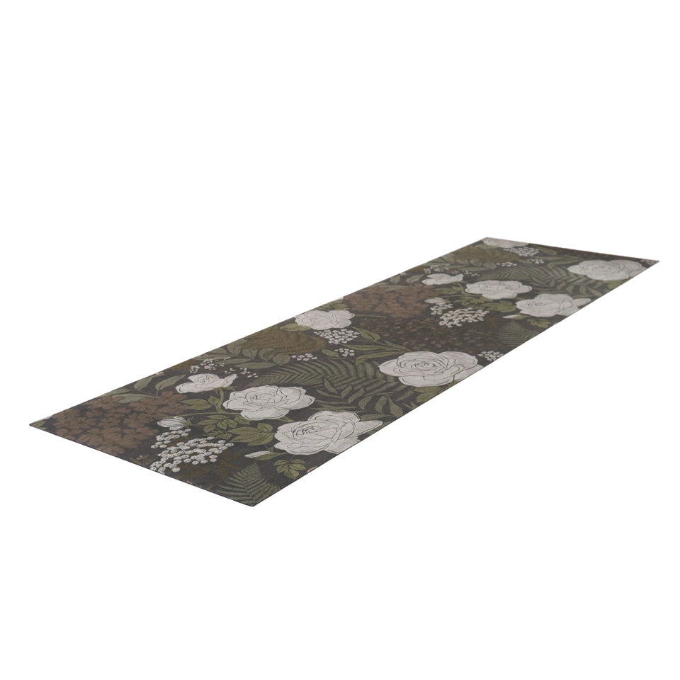 Interior home decor runner in dark floral with linen texture on low profile washable floor mat
