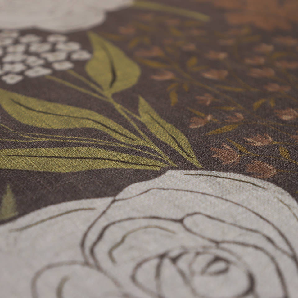 Close up of dark floral with linen texture on low profile washable floor mat