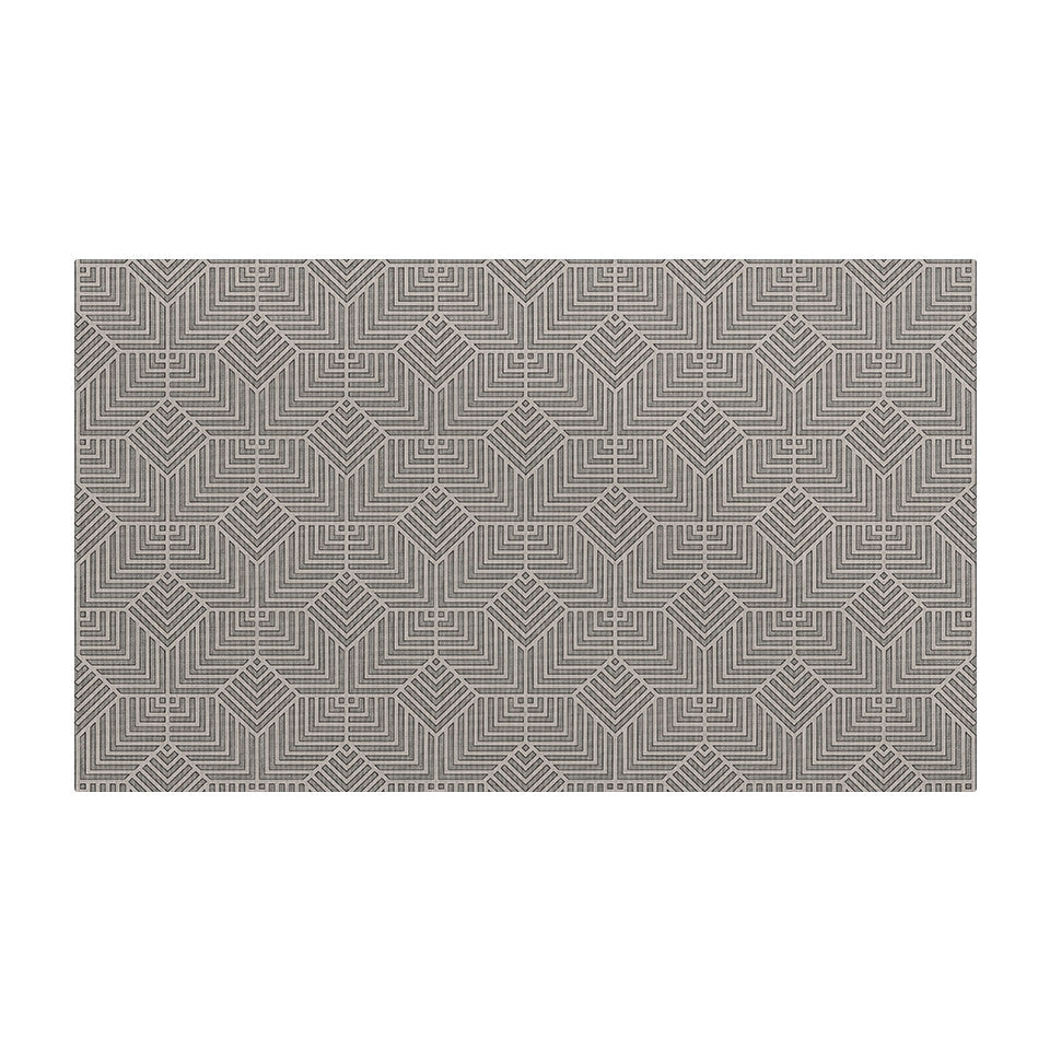 Overhead image of Un-Rug's medium sized Diamond Deco mat design with a geometrical design in creamy colors.