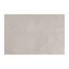 Overhead shot of Shiitake tan colored linen background with white dotted fan design on a low profile washable floor mat in large