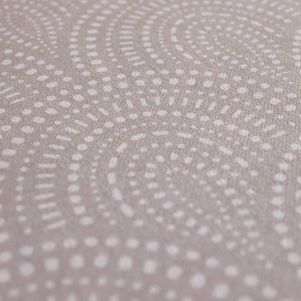 Close up of shiitake tan colored linen background with white dotted fan design on a low profile washable floor mat