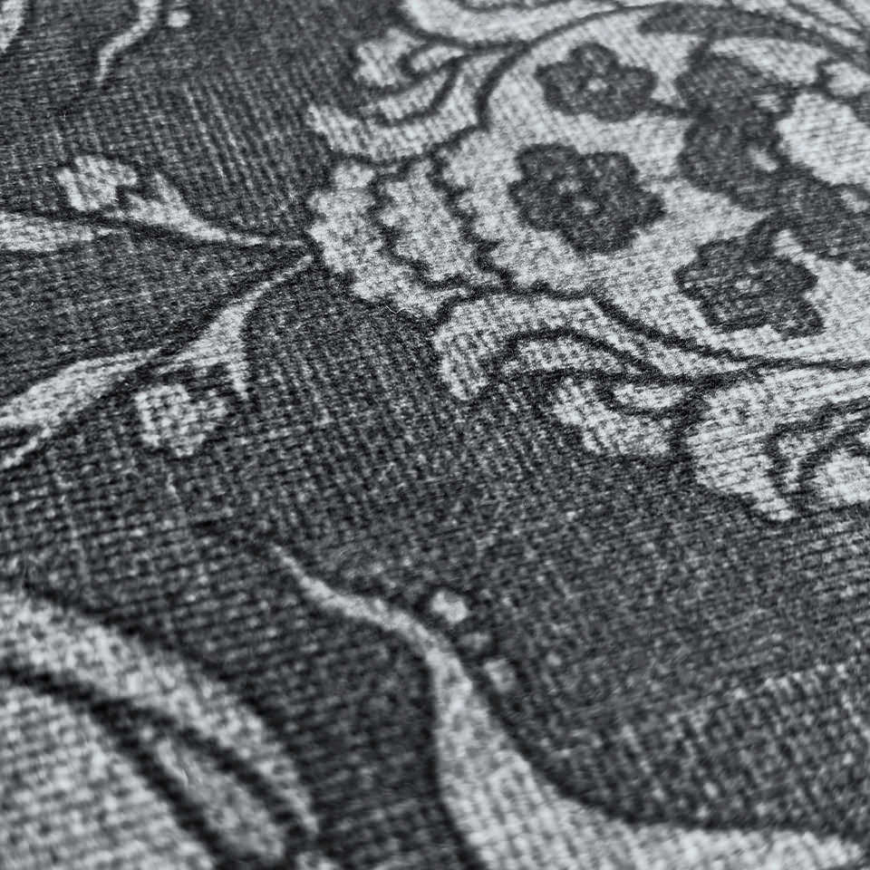 Close up image Filigree Floral surface in greyish brown tones.