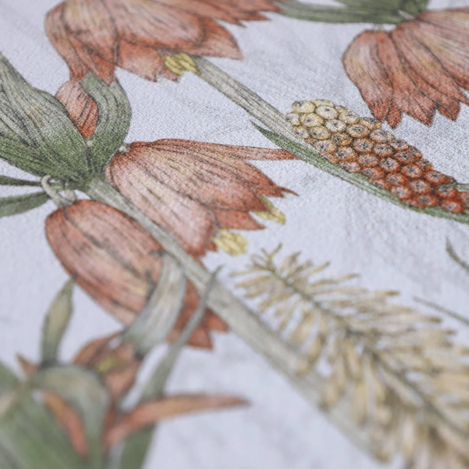 Close up of Light floral print with pink flowers on light grey greige background on a low profile washable floor mat