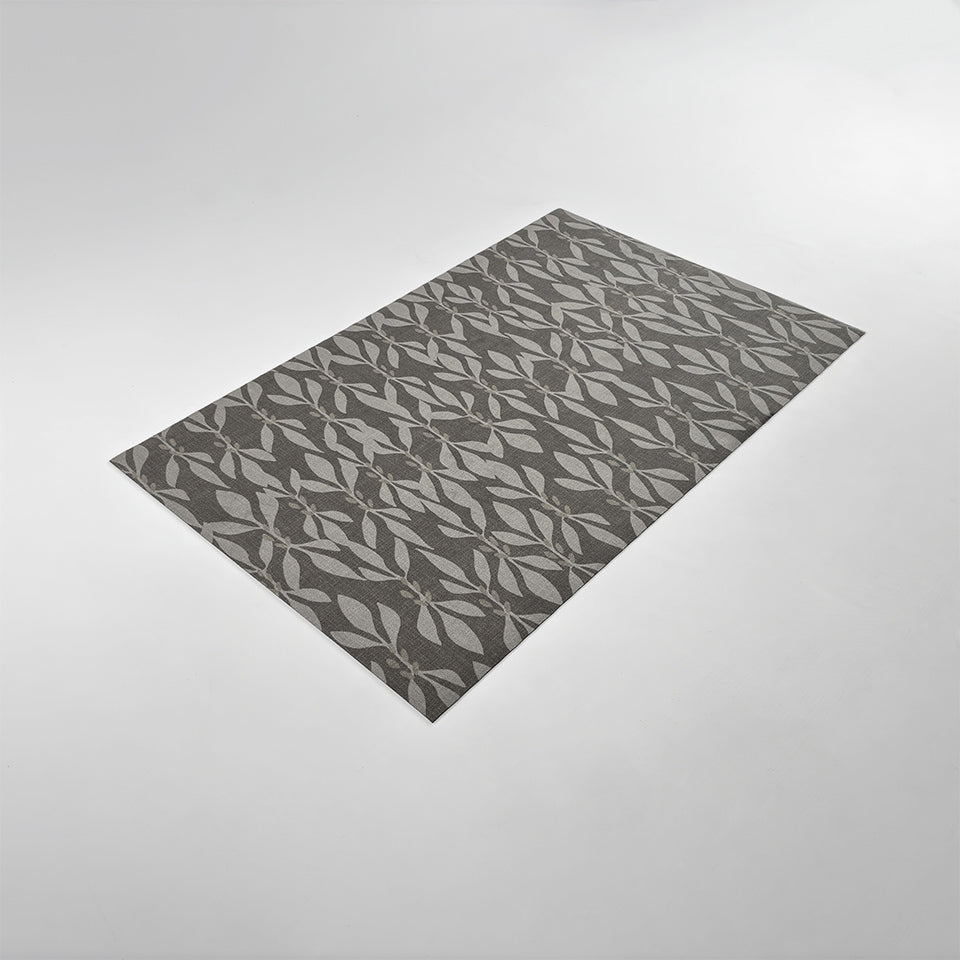 Angle overhead image of Un-Rug's Leaf Motif mat in the size small.