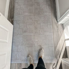 Organic Squares shiitake tan with snowbound cream-colored organic lines protecting hallway floors