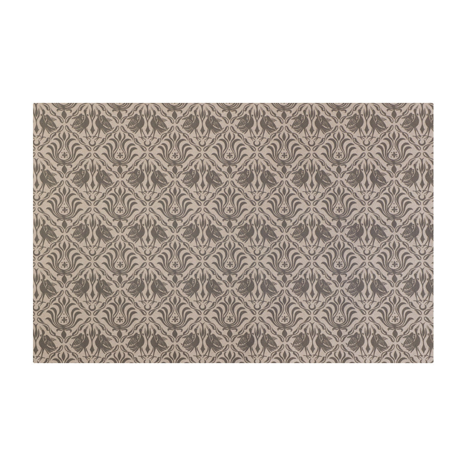 Overhead of Urbane bronze ornamental cranes in damask pattern printed on shiitake tan; washable low profile indoor small mat