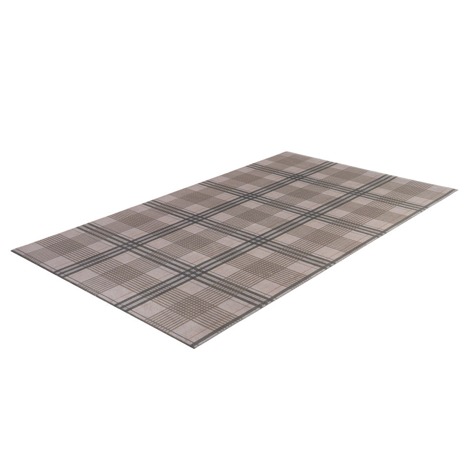 Overhead angled shot of Shiitake tan printed linen texture with urbane bronze brown plaid stripes on a low profile washable indoor floor mat