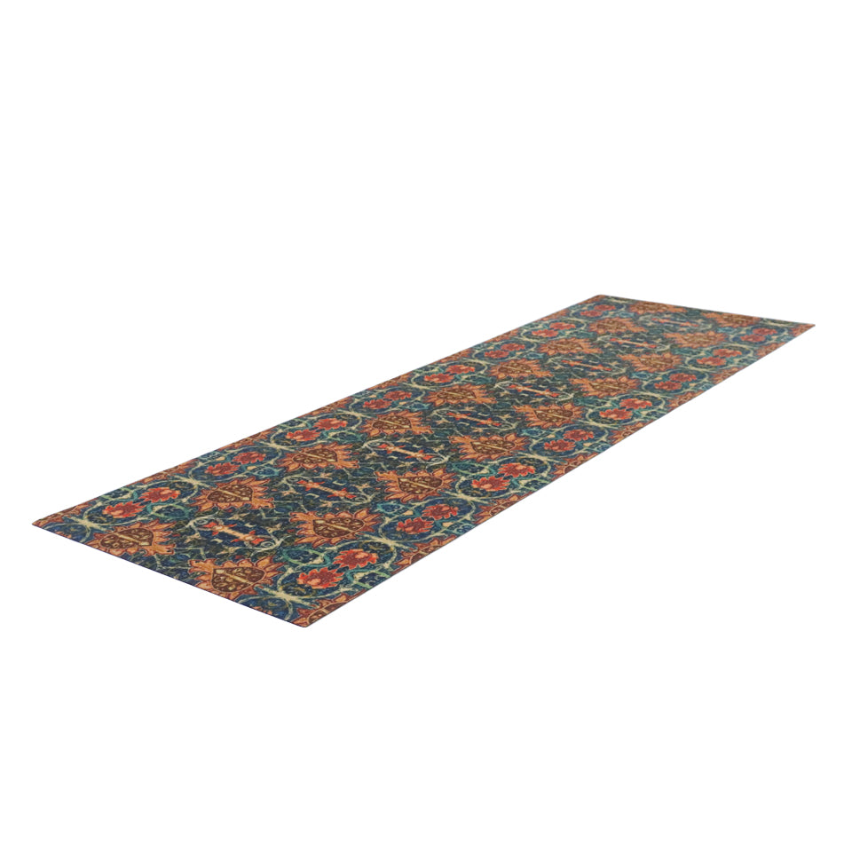 Colorful vibrant Persian style rug with burnt orange, navy, teal, greens, yellows, blues in a repeating ornate pattern on a washable indoor floor mat