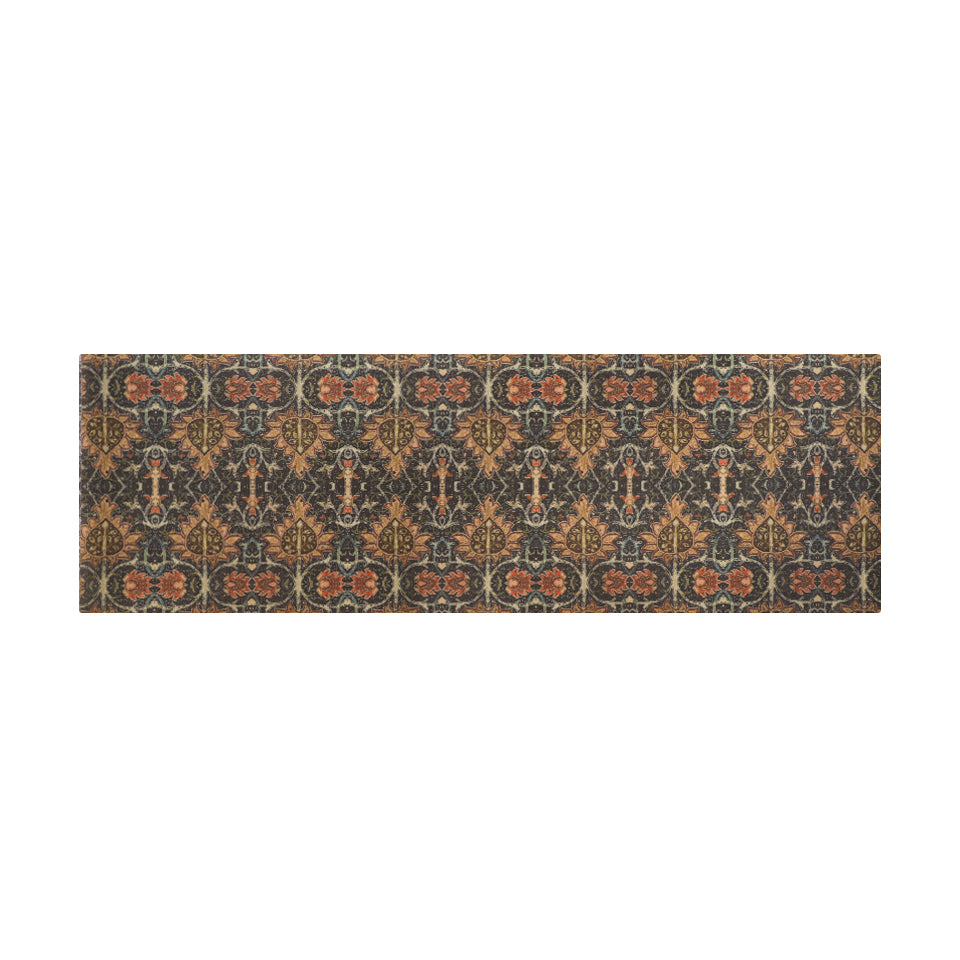 Colorful muted vibrant Persian style rug with burnt orange, navy, teal, greens, yellows, blues in a repeating ornate pattern on a washable indoor floor mat