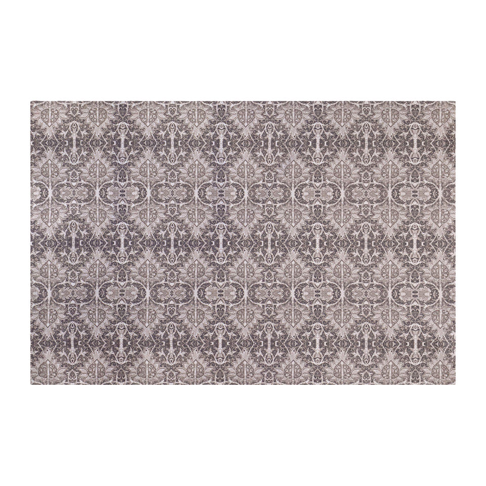 Neutral Persian style rug with greys, tans, and browns in a repeating ornate pattern on a washable indoor floor mat