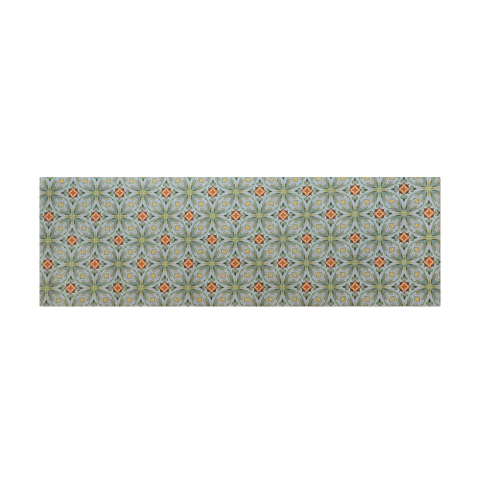 Kitchen runner sized Neutral kaleidoscope pattern in aquas, apple green, and hints of orange on this low profile washable interior floor mat. 