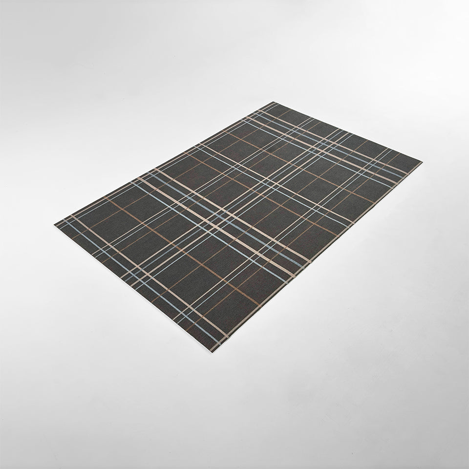 Angled overhead image of Un-Rug's Sydney Plaid mat in the size small.