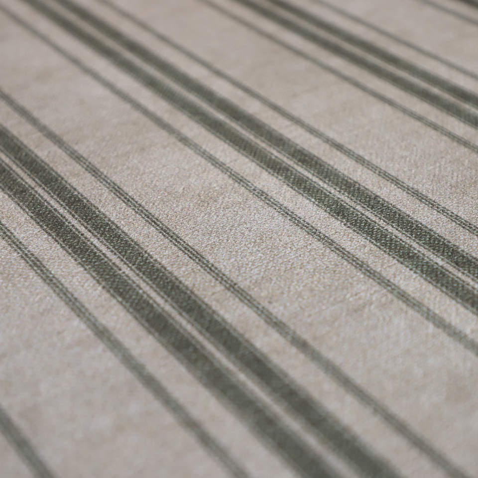 close up of soft fabric with beige and green stripes
