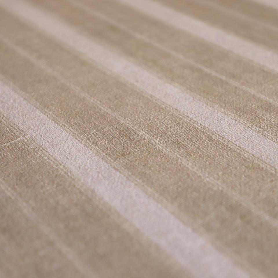 close up on soft knitted fabric surface with light neutral stripes