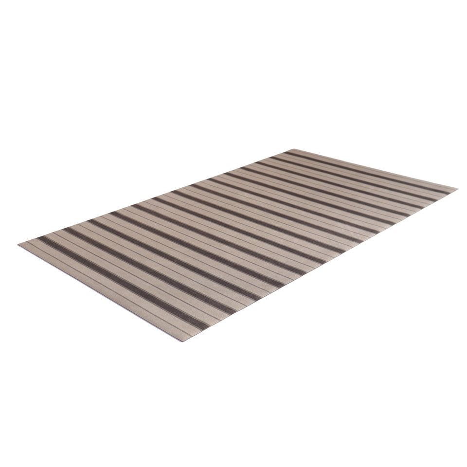 rectangular mat with light and dark neutral colored vertical stripes