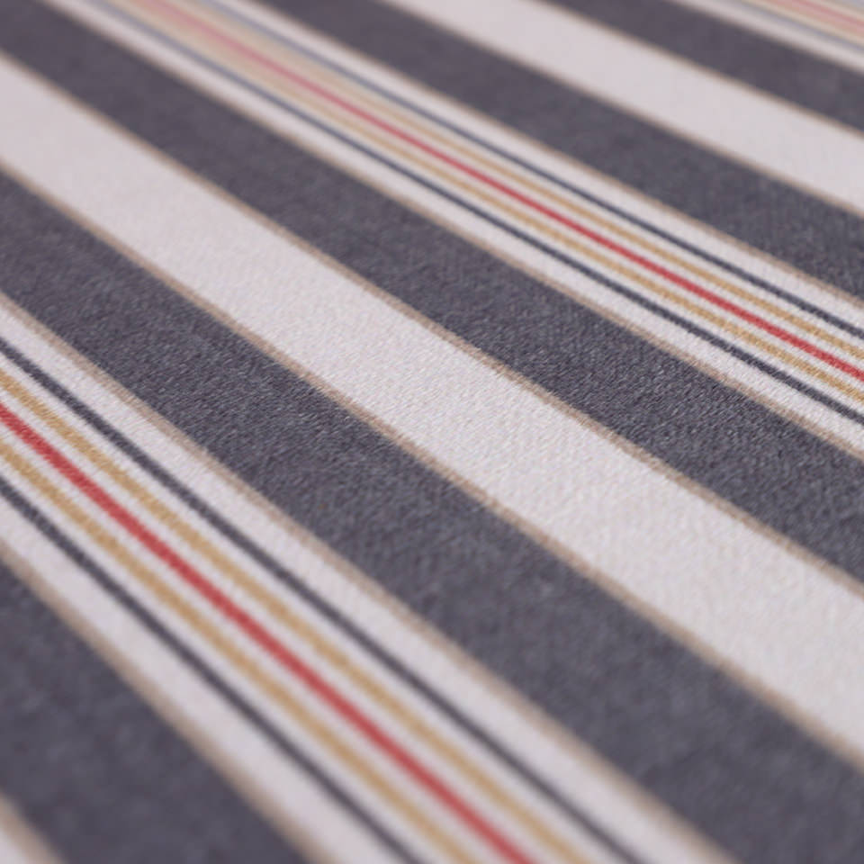 close up of fabric surface with multi colored stripes