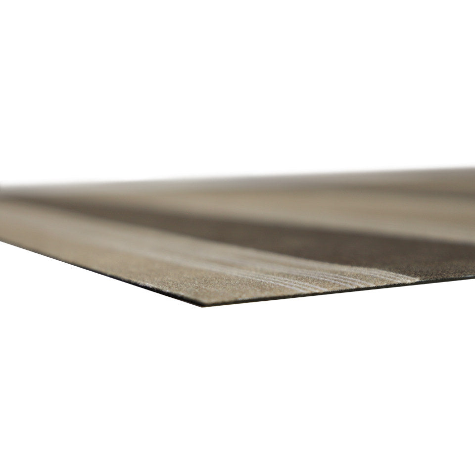 corner of extremely low-profile, flat, thin mat with rubber backing and soft fabric surface