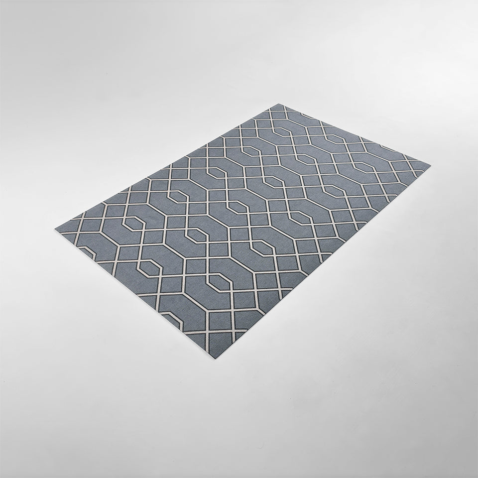 Overhead angle image of Un-Rug's Timeless Trellis accent mat in the size small.