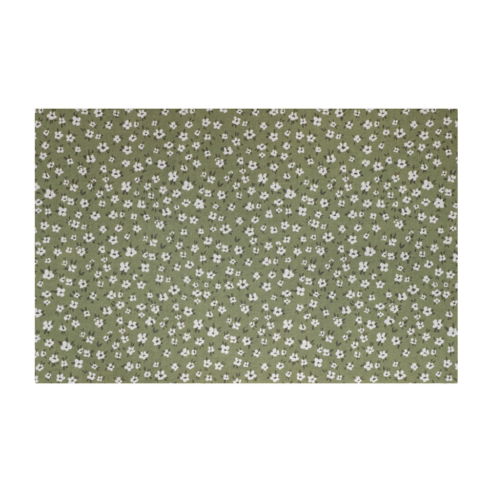 isolated green mat with tiny white flowers