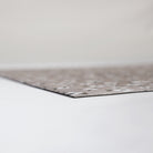 corner image of extremely thin low-profile mat with rubber backing and soft smooth surface