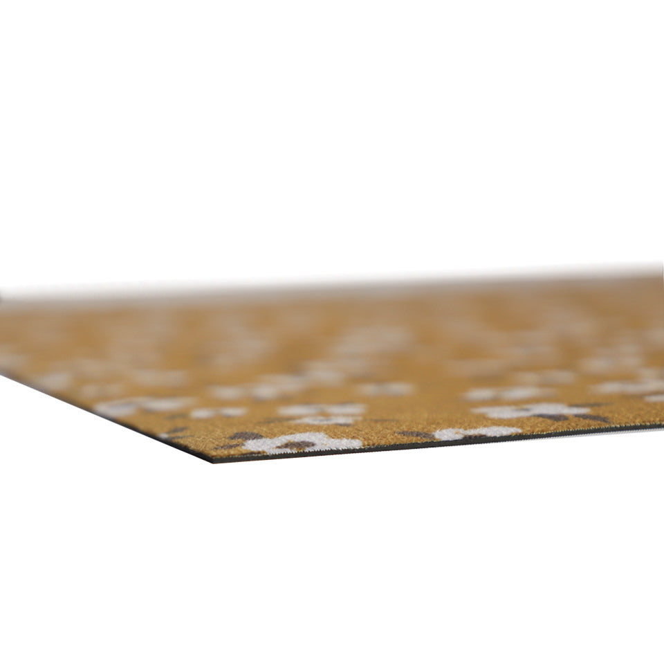very thin low-profile mat with soft fabric surface and rubber backing