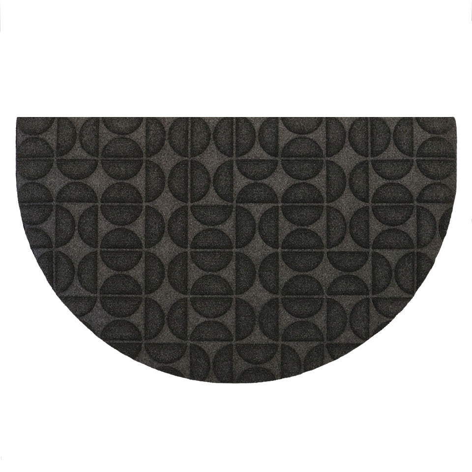 Overhead of WaterHog Luxe's Hourglass half-round mat in graphite with semi-oval alternating pattern and borderless edges