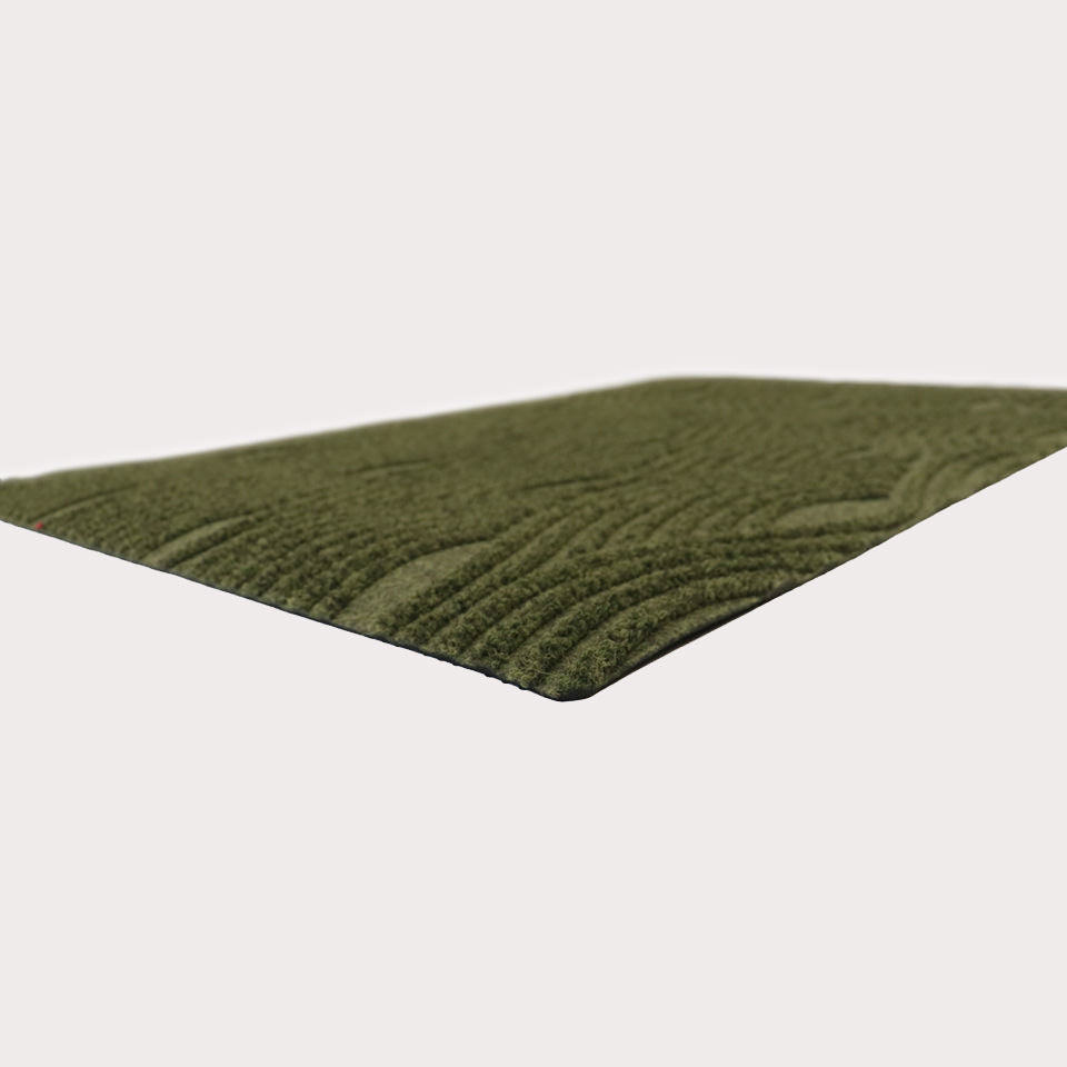 Angular shot of Waves in olive showing the bi-level surface and low-profile.