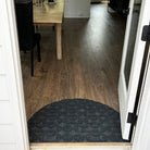 WaterHog-Luxe half around doormat at the entrance of a home in the colors graphite.