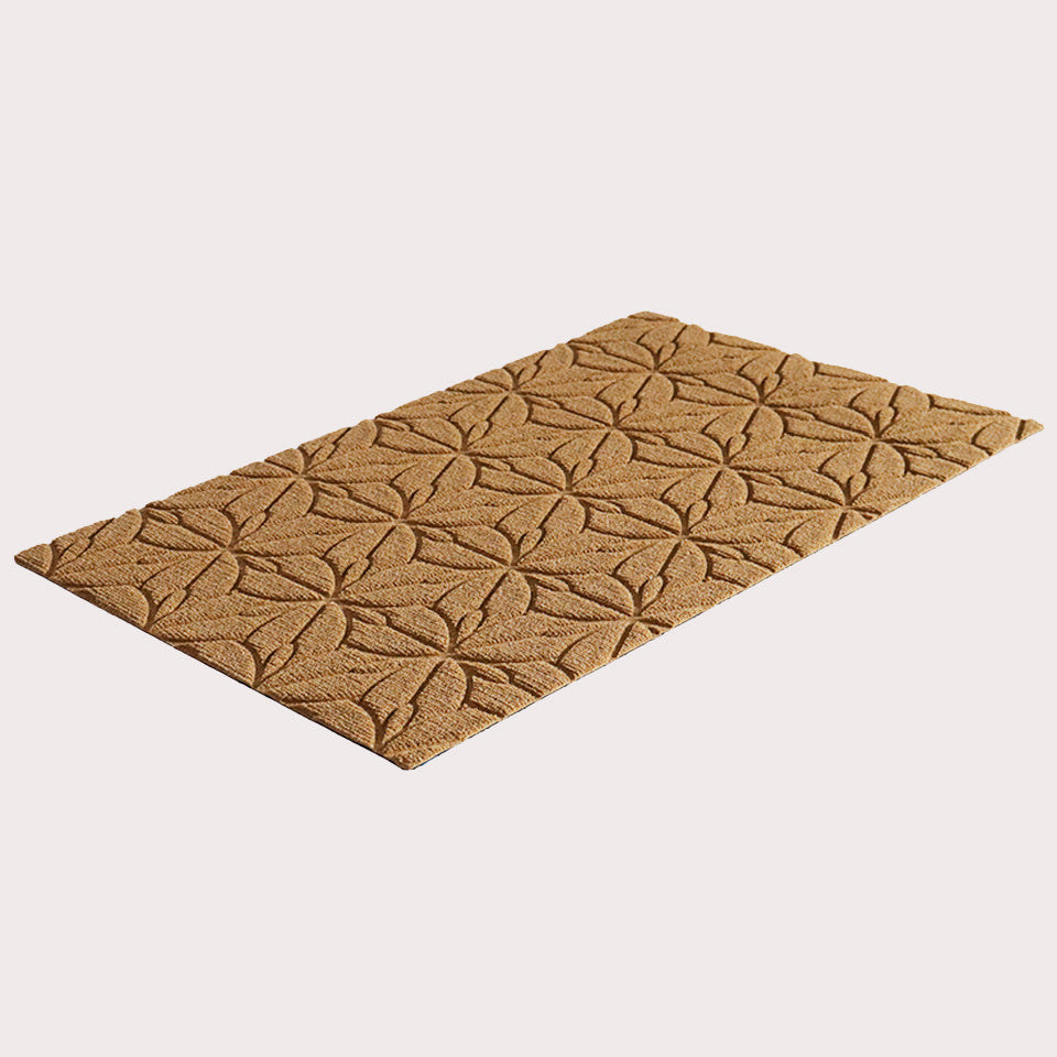 Angled image of the single-door Magnolia mat in the color wheat on a creamy white background. 