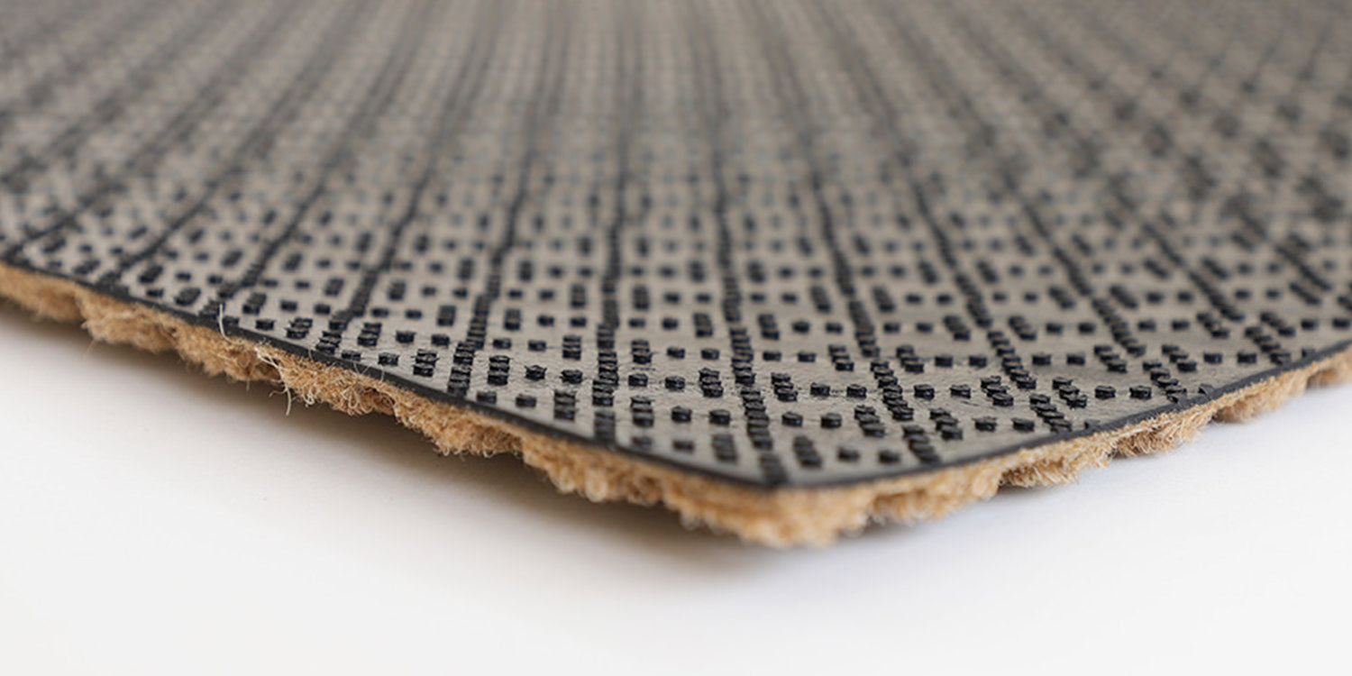 WaterHog Luxe's commercial-grade, durable rubber backing that won't crack, crumble, or rot.