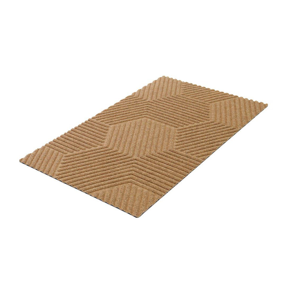 Tan low profile all weather doormat for indoors or outdoors.  Zephyr geometric patterned doormat.