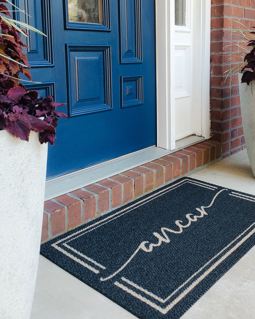 Last name personalized door mat at front door