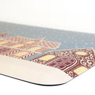 Corner view Gingerbread House Christmas anti-fatigue kitchen mat with wipeable surface and winter holiday design for kitchen comfort.
