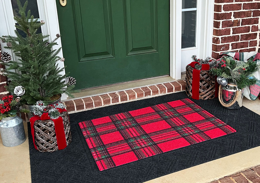 Red Tartan plaid doormat in front of green door