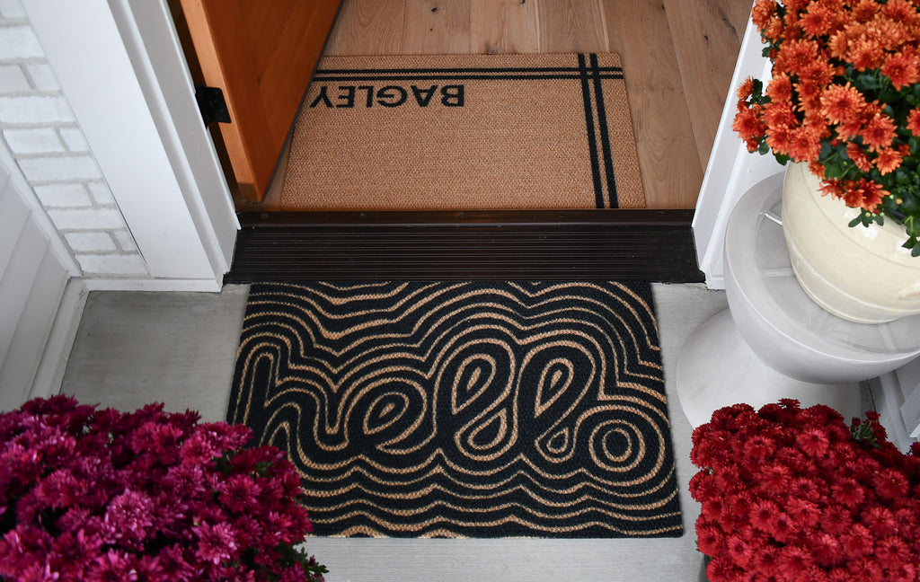 Single door doormat with groovy hello design paired with personalized doormat
