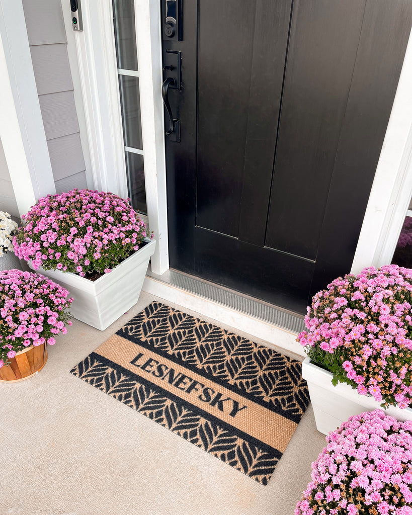 Personalized doormat with name at front door