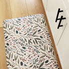 Sprig & Berry foliage Christmas anti-fatigue kitchen mat with wipeable surface and winter holiday design for kitchen comfort.