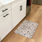 Sprig & Berry foliage Christmas anti-fatigue kitchen mat with wipeable surface and winter holiday design for kitchen comfort.