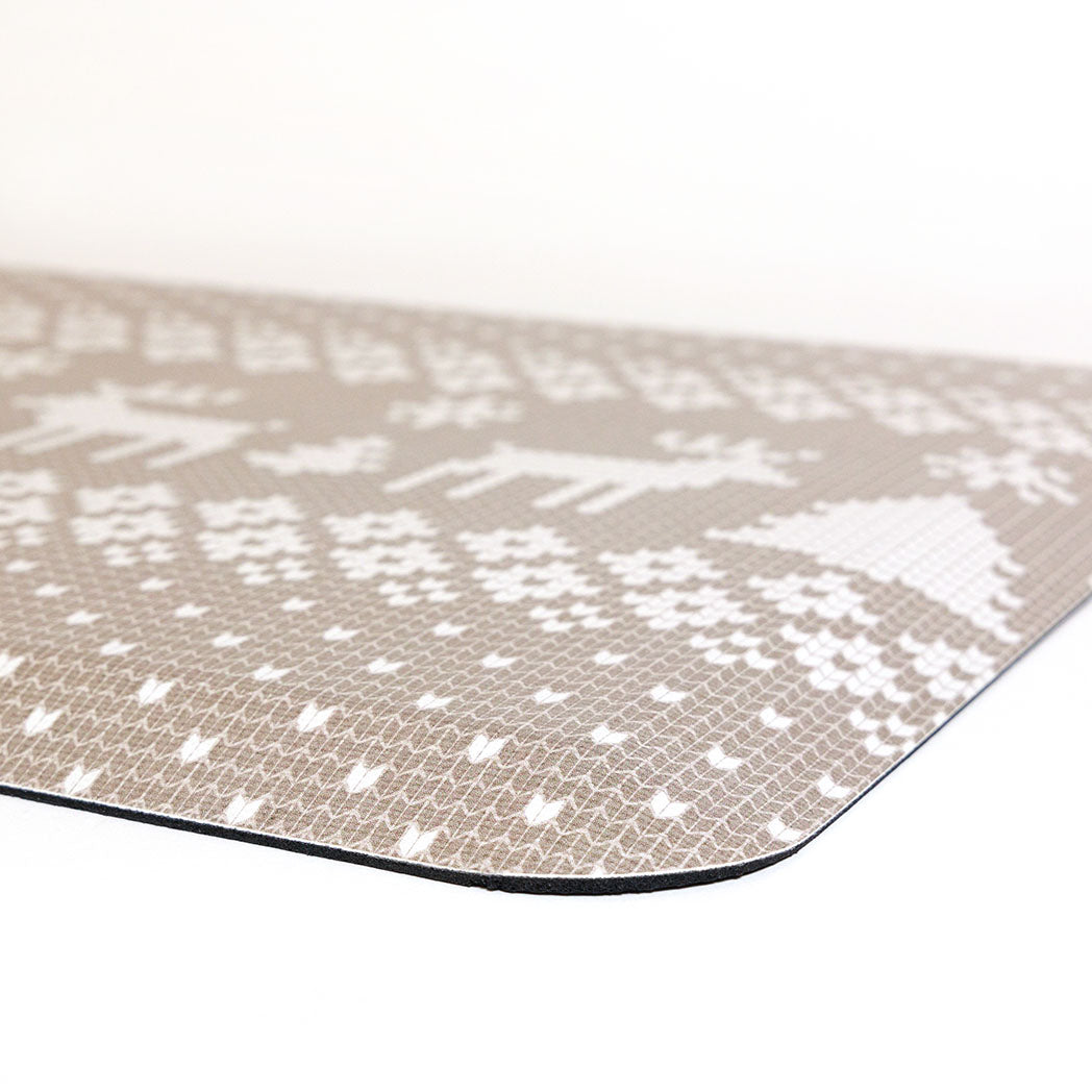 Corner of the comfortable Happy Feet standing comfort mat's sloped edge