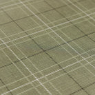Close up detail of classic green plaid anti-fatigue kitchen mat with wipeable surface and neutral design for kitchen comfort.