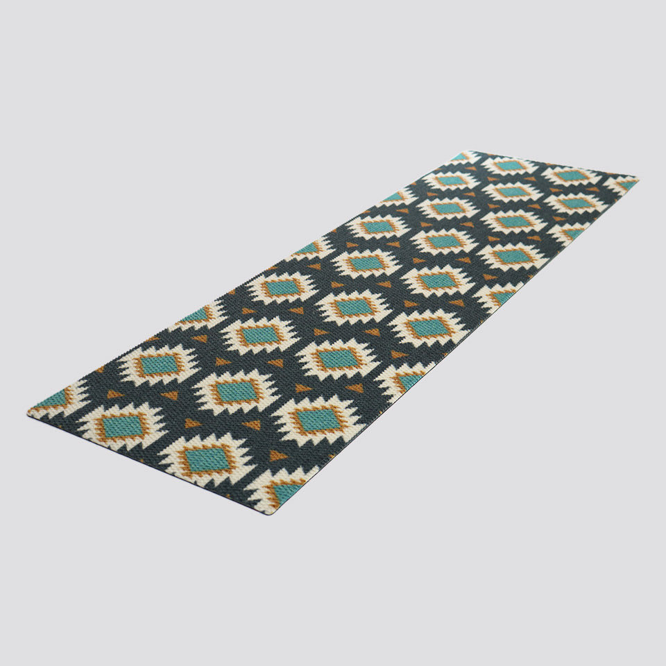 isolated image of diagonal Aztec double doormat in gray and teal