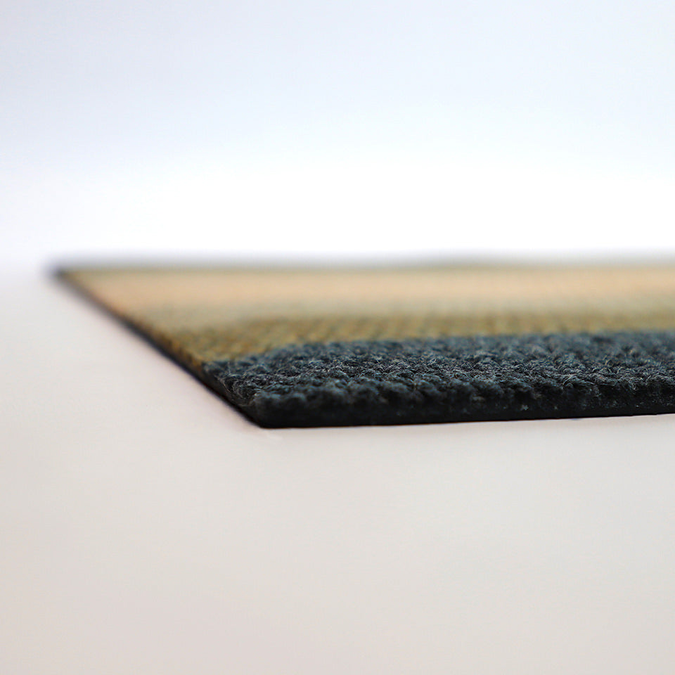 Low-profile doormat in a classic stripe pattern helps in reducing risk of trips and falls.