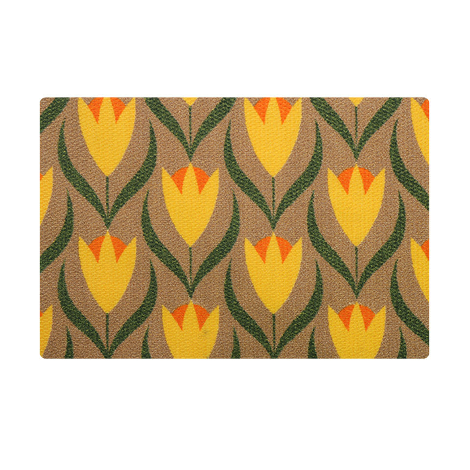 coir single sized doormat with yellow, orange, and green floral design