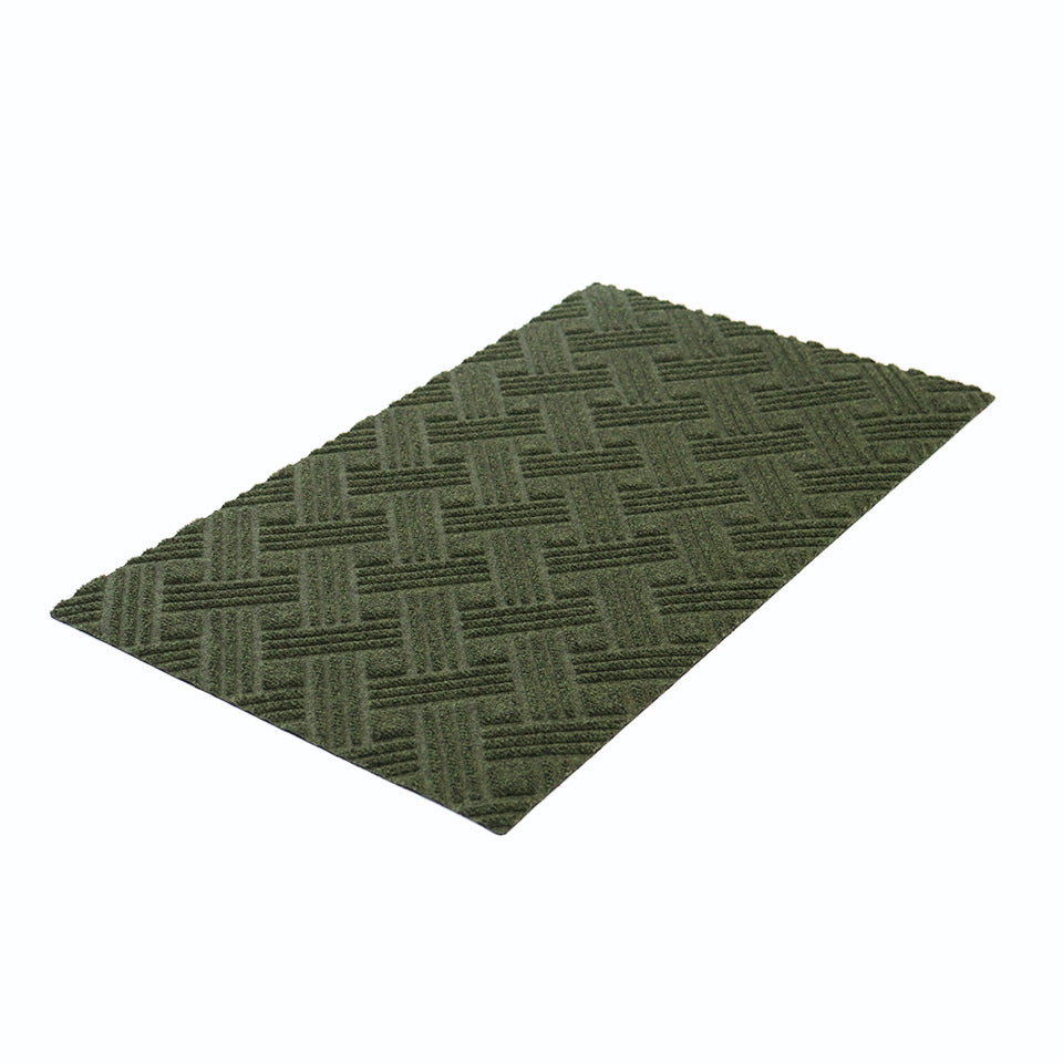 angled single door sized WaterHog Luxe classic thatch doormat in olive (green)