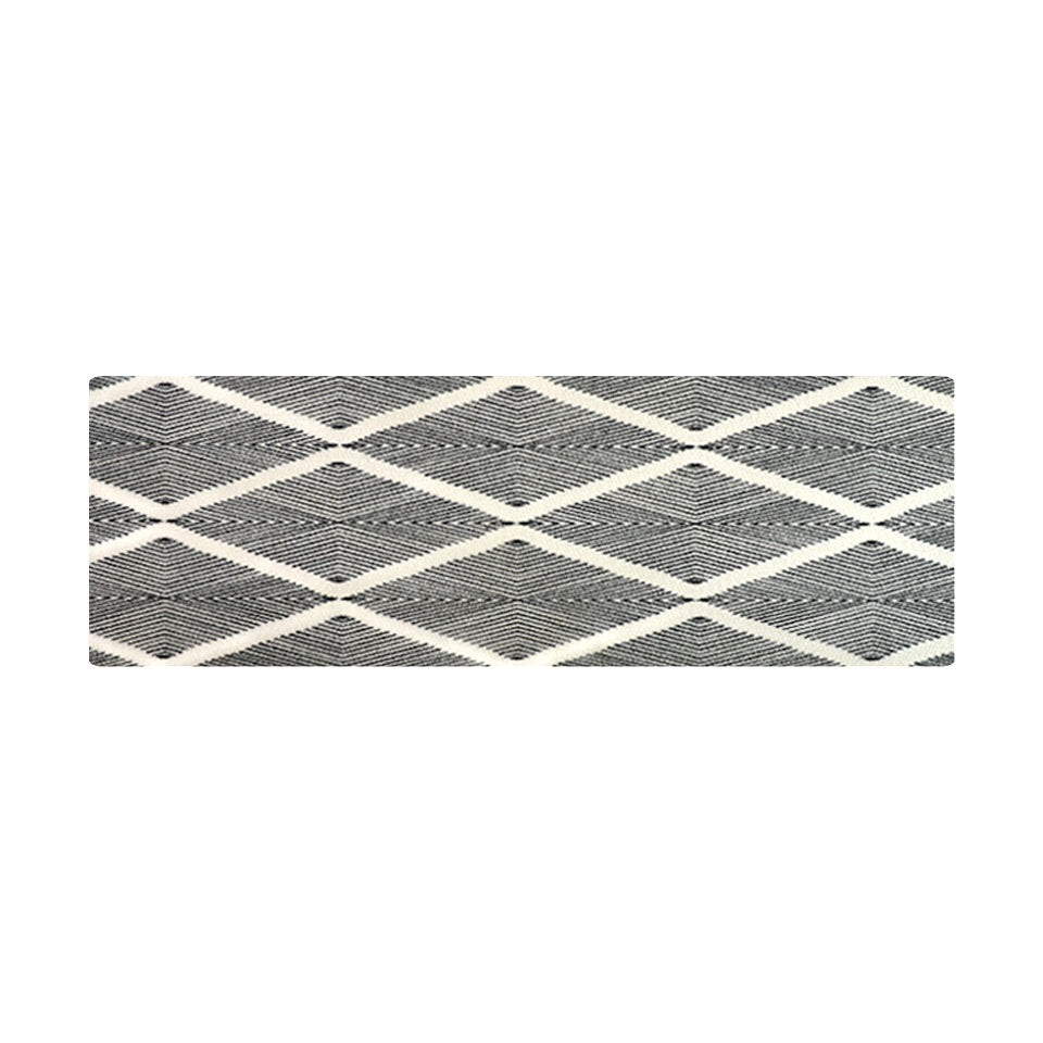 Modern doormat with classic but stylish black and white pattern can also be used as a bathroom mat.