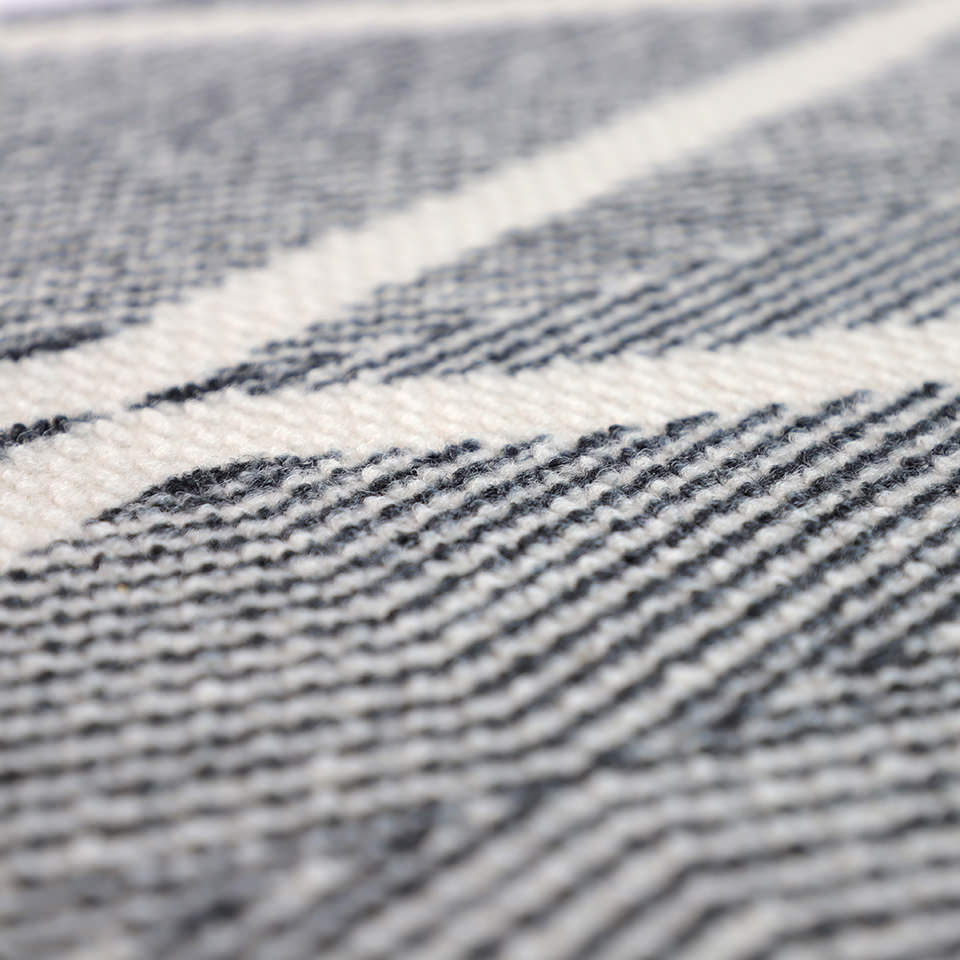 Diamond geometric patterned door mat in black is a great indoor/outdoor mat for catching dirt and grass.