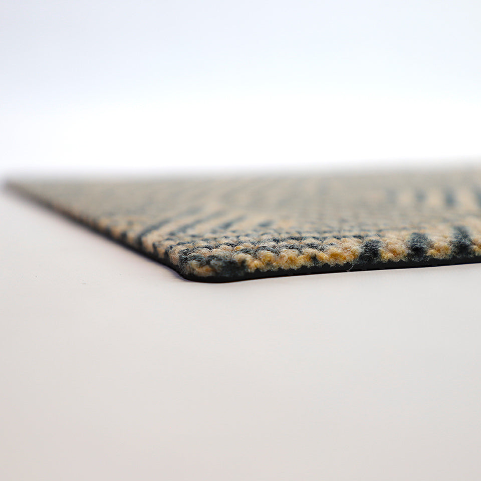 Low-profile indoor mats like the Escher decorative doormat are great for indoors as they are low-profile and are a less likely trip hazard compared to thicker rugs and carpeted mats.