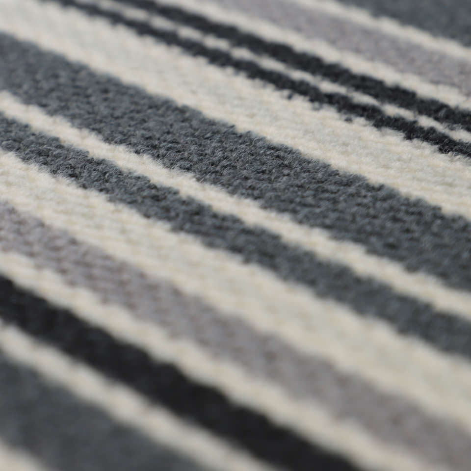 Close up of grey stipes on non shedding doormat